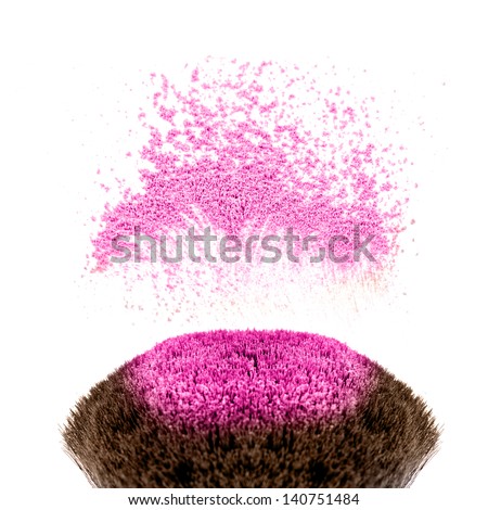 Makeup brushes and powder in motion Royalty-Free Stock Photo #140751484