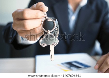 Car dealers send car keys to customers. Buying a car with installment payment through a credit card    