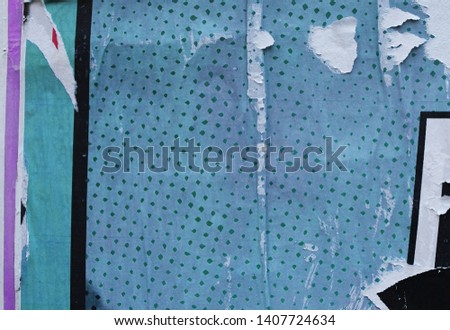 Worn out vintage discoloured turquoise blue wall poster, creative retro paper texture pattern Royalty-Free Stock Photo #1407724634