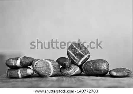 Rows of striped stones on a table