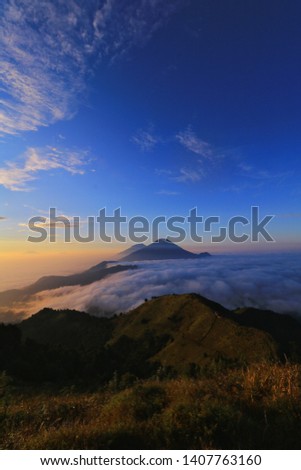 the beauty of the morning sun on the peak of Mount Prau, Central Java, Indonesia 2018