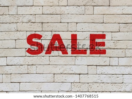 Sale marketing banner, red capital letters advertisement on a white brick wall front view, online banner ad with copy space for coupon