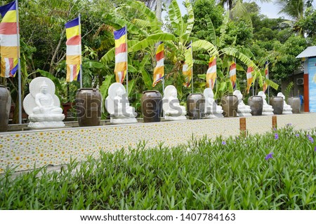 Inside the Phat Hoc 2 pagoda with goden statues and objects, Soc Trang, Viet Nam