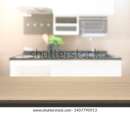 Table Top And Blur Kitchen Room Of  Background