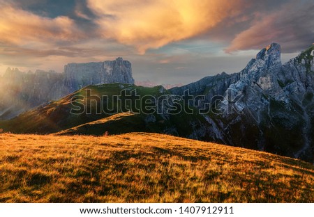 Amazing natural Landscape with colorful sky of Dolomites Alps during sunset. Passo Giau. Dolomite mountains. italy. Incredible nature scenery. Picture of wild area. Famous alpine place of the world