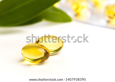Fish oil in capsules. For health and immunity isolated on white  - Image