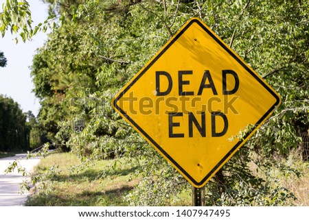 Dead end sign on a country road