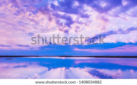 Beautiful scenery with colorful sky, beautiful water reflectioncloud, clouds and sunbeams.Artistic picture. Beauty world.