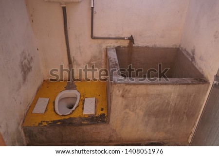 empty old bathroom and toilet