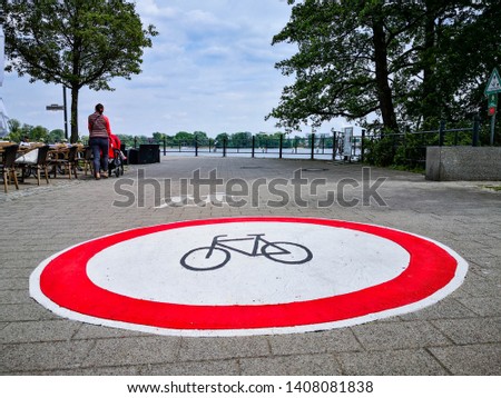 Big "no cycling" sign on ground