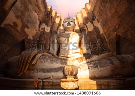 Ancient buddha statue (Phra Achana Wat Si Chum) Si Chum temple, Sukhothai Historical Park, Sukhothai Province Thailand.