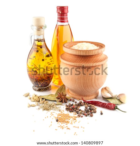 rice and olive oil with spices isolated on white