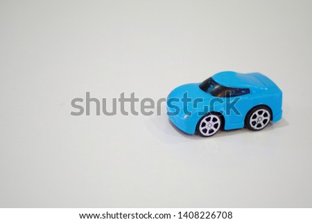 Racing blue car toys isolated on white background