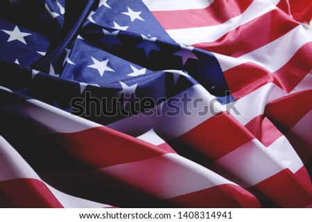 Background of wave flag of the United States of America. Symbol of freedom and independence.