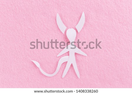 paper art of devil man. pink background