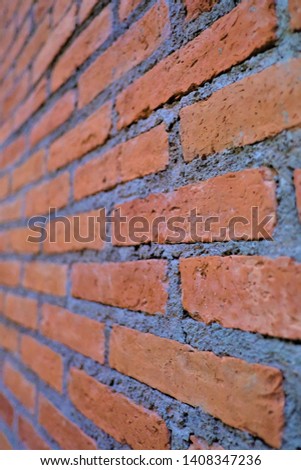 Red brick wall with perspective as a background,texture of the brick wall