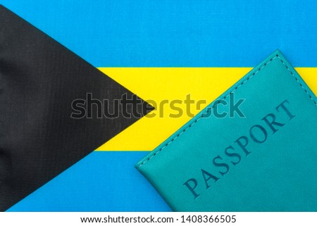 On the flag of the Bahamas is a passport. The concept of travel and tourism.
