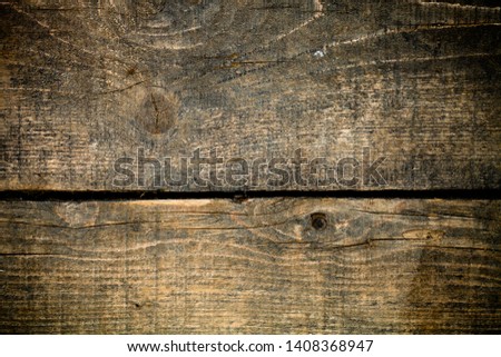 Old wooden rustic texture for background. Rough weathered wooden board. Toned.
