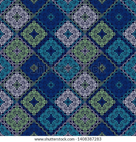 Ethnic boho seamless pattern. Embroidery on fabric. Patchwork texture. Weaving. Traditional ornament. Tribal pattern. Folk motif. Can be used for wallpaper, textile, wrapping, web.