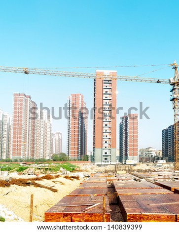 building under construction with workers