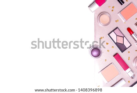 decorative cosmetics laid out on a Golden shiny background concept new year holiday birthday square flat lay with copy space
