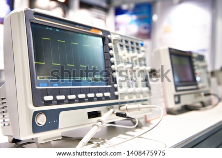 Oscilloscope spectrum analyzer in store exhibition Royalty-Free Stock Photo #1408475975