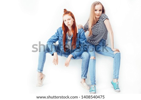 two best friends teenage girls together having fun, posing emotional on white background, besties happy smiling, making selfie, lifestyle people concept