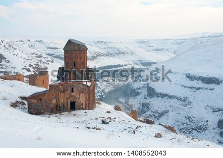 Ani ruins in snow scenery, Kars, Turkey Royalty-Free Stock Photo #1408552043