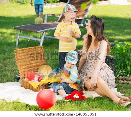 Happy family picnicking