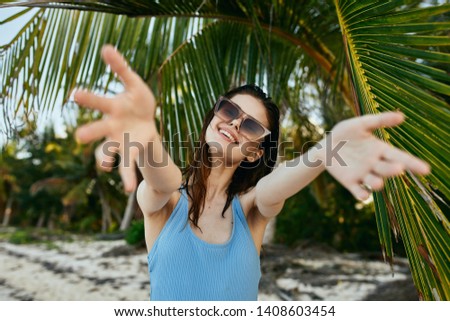 Pretty woman palm leaves Caribbean islands bikini beach vacation travel sun 