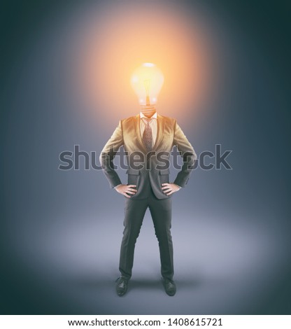 Businessman with a lit light bulb instead of head.