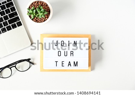 join our team text on lightbox composition on white table background,Business Concept