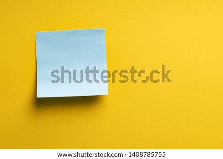 Blank blue sticker on yellow color background. Copy space Creative vintage background. Template for lettering.