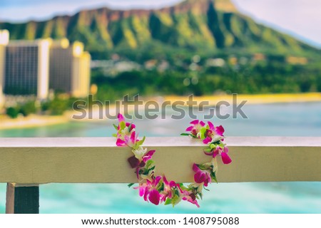 Hawaii background hawaiian flower lei with Waikiki beach landscape. Royalty-Free Stock Photo #1408795088