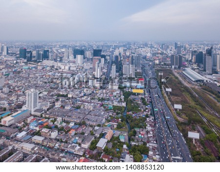 Aerial view of Rama 9 road, New CBD, Bangkok Downtown, Thailand. Financial district and business centers in smart urban city in Asia. Skyscraper and high-rise buildings. Top view.
