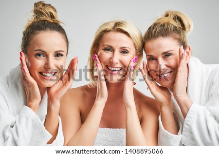 Picture showing group of happy friends in spa Royalty-Free Stock Photo #1408895066