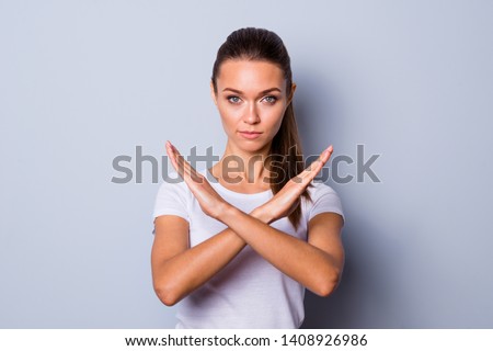 Close up photo amazing beautiful she her lady pretty hairstyle arms hands fingers palms crossed not allow violence stop war make love calling wear casual white t-shirt clothes isolated grey background Royalty-Free Stock Photo #1408926986
