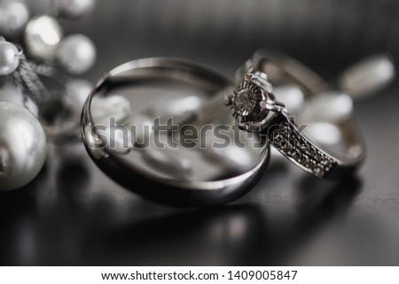 gold wedding rings on an abstract background with copy space