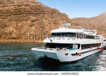 Sunrise panoramic Luxury yacht. Landscape seascape Egypt coastline Sinai Rocky Mountains Africa. Landscape of the Red Sea. Vacation destination concept.