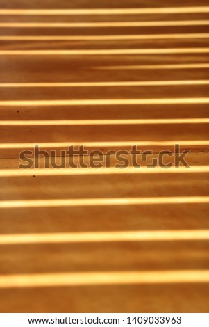 Pattern of light reflections on the floor architecture detail rays