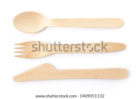 Wooden, disposable tableware on a white background. Eco-friendly materials.