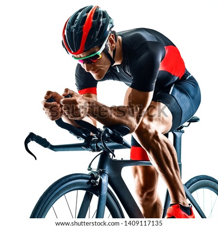 triathlete triathlon Cyclist cycling  in studio silhouette shadow  isolated  on white background Royalty-Free Stock Photo #1409117135