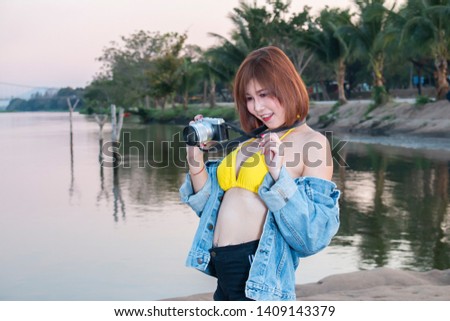 young asian  woman having photography fun