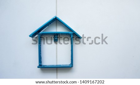 Arrangement of house model on white background. Buy or sell property concept.