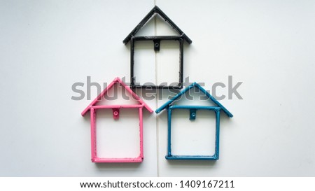 Arrangement of house model on white background. Buy or sell property concept.