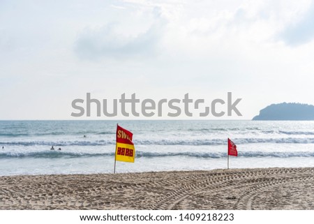 Strong wave warning flag Play water carefully, katabeach