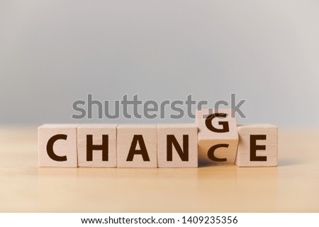 Wooden cube flip with word "change" to "chance", Personal development and career growth or change yourself concept Royalty-Free Stock Photo #1409235356