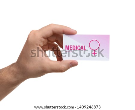 Man holding medical business card isolated on white, closeup. Women's health service