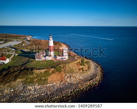 Montauk Lighthouse and beach aerial shot, Long Island, New York, USA. 