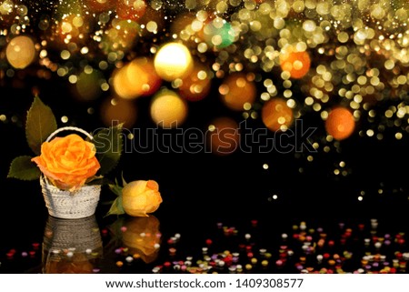  beautiful yellow roses with and green leaves in a beautiful white basket on a shiny background